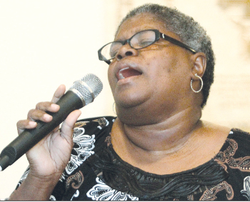 A.J. Reed Gospel Ensemble members praise God